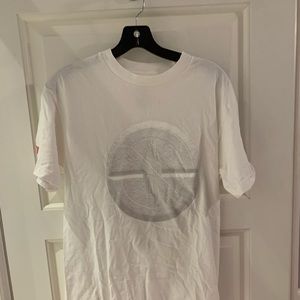 White T-shirt with a diamond on the back